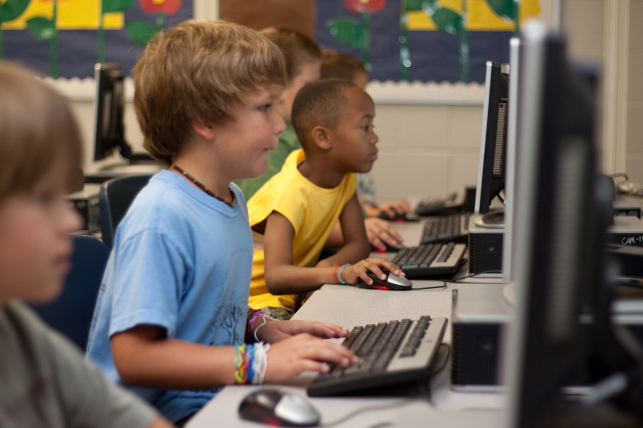 Kids at computers actively engaged